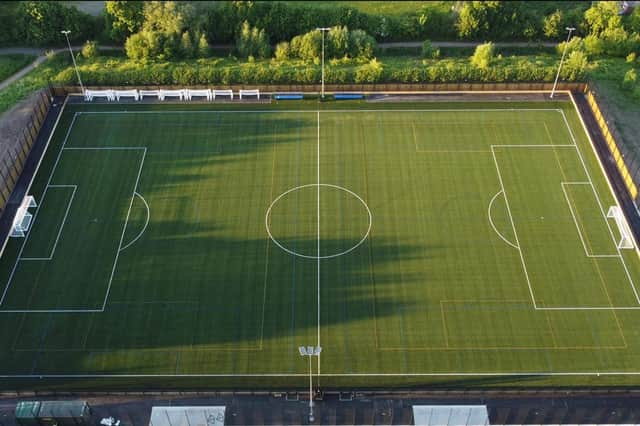 How many Acres is a Football field in England